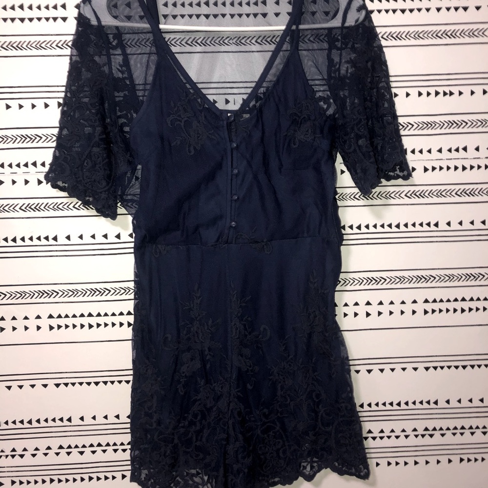 Beautifully detailed lace romper